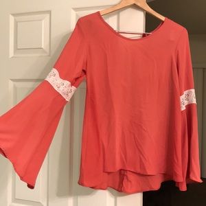 Salmon colored peplum sleeve top